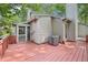 Back of house showing deck, screened in porch and a/c unit at 124 Twin Oaks Pl, Cary, NC 27511