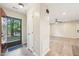 Inviting foyer leads into the open living area with laminate flooring at 124 Twin Oaks Pl, Cary, NC 27511