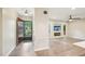 Inviting living room with wood floors, a decorative fireplace, and ample natural light at 124 Twin Oaks Pl, Cary, NC 27511
