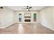 Spacious living room features sleek floors, recessed lighting and a modern electric fireplace at 124 Twin Oaks Pl, Cary, NC 27511