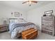 Bedroom features a wooden storage chest at the foot of the bed at 13 Toplanders Ter, Gibsonville, NC 27249