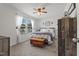Bedroom with a ceiling fan and a beautiful storage chest at 13 Toplanders Ter, Gibsonville, NC 27249