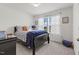 Cozy bedroom features soft carpet and plenty of natural light at 13 Toplanders Ter, Gibsonville, NC 27249