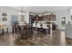 Eat-in kitchen featuring a dining table and a center island, showcasing great space for dining and socializing at 13 Toplanders Ter, Gibsonville, NC 27249