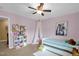 Charming bedroom with daybed and whimsical decor at 1428 White Opal Dr, Knightdale, NC 27545