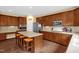 Modern kitchen boasting stainless steel appliances, ample cabinet space, and a breakfast bar at 1428 White Opal Dr, Knightdale, NC 27545