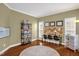 Versatile home office with stylish laminate flooring, ample storage, and natural light at 1428 White Opal Dr, Knightdale, NC 27545