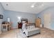 Bedroom features vaulted ceilings, natural light, and neutral colors at 150 Teal Dr, Youngsville, NC 27596
