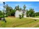 Charming two-story home with light siding, a well-maintained lawn, and mature trees, and a two car garage at 150 Teal Dr, Youngsville, NC 27596