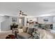 Comfortable open living space with updated floors and paint next to a modern kitchen at 150 Teal Dr, Youngsville, NC 27596