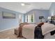 Tranquil main bedroom with vaulted ceiling, ensuite bathroom, and soft natural light at 150 Teal Dr, Youngsville, NC 27596