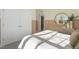 Comfortable bedroom with neutral tones, featuring a plush bed and serene ambiance at 158 Vaughan Farms Drive Dr, Angier, NC 27501