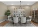 Tastefully decorated dining area featuring modern lighting and seating, perfect for Gathering meals and entertaining at 158 Vaughan Farms Drive Dr, Angier, NC 27501
