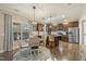 Spacious kitchen featuring granite countertops, stainless steel appliances, and an eat-in kitchen at 187 Farrah-Shea Way, Angier, NC 27501