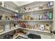 Organized walk-in pantry with an abundance of shelving and storage containers at 187 Farrah-Shea Way, Angier, NC 27501