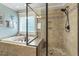 Beautiful walk-in glass shower with tile surround and bench seating at 187 Farrah-Shea Way, Angier, NC 27501