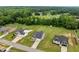 Stunning aerial shot showcases neighborhood homes with beautiful green lawns and mature trees surrounding the properties at 206 Heart Pine Dr, Wendell, NC 27591