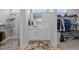 Bathroom featuring a vanity with a mirror, and access to two walk-in closets at 206 Heart Pine Dr, Wendell, NC 27591