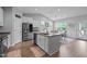 Modern kitchen featuring stainless steel appliances and a functional center island at 206 Heart Pine Dr, Wendell, NC 27591