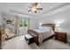 Bedroom featuring a trey ceiling, neutral walls, carpet floors and natural light from the exterior window at 206 Heart Pine Dr, Wendell, NC 27591