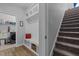 Spacious mudroom with a utility sink and extra storage space and easy access to the stairs at 206 Heart Pine Dr, Wendell, NC 27591