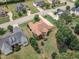 Aerial image features the backyard of a home with a patio, beautiful lawn, and mature landscaping at 212 Fieldtrial Cir, Garner, NC 27529