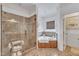 Well-lit bathroom featuring tiled shower, soaking tub with jets, and a window at 212 Fieldtrial Cir, Garner, NC 27529
