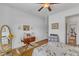 Bedroom showcasing hardwood floors, neutral walls, and tasteful furnishings for a cozy atmosphere at 212 Fieldtrial Cir, Garner, NC 27529