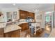 Charming kitchen showcasing granite countertops, stainless steel appliances, and a decorative backsplash at 212 Fieldtrial Cir, Garner, NC 27529