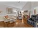 Bright living room with vaulted ceiling and an assortment of recliners at 212 Fieldtrial Cir, Garner, NC 27529
