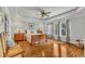 Spacious main bedroom showcasing hardwood floors, a decorative ceiling, and a backyard view at 212 Fieldtrial Cir, Garner, NC 27529