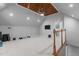 Finished bonus room with wood tray ceiling and stairs at 215 Collinson Dr, Chapel Hill, NC 27514