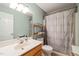 Bathroom with a single sink, a toilet, and a shower-tub combo at 215 Virginia Pine Dr, Clayton, NC 27520