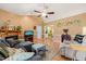 Inviting living room with a fireplace, hardwood floors, and a comfortable seating arrangement at 215 Virginia Pine Dr, Clayton, NC 27520