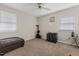 Bedroom featuring carpet, a ceiling fan, natural light and space for exercise equipment at 2423 Northern Bnd, Burlington, NC 27217