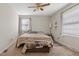 Bright main bedroom with carpet, a ceiling fan, natural light and calming decor at 2423 Northern Bnd, Burlington, NC 27217