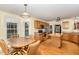 Bright eat-in kitchen features stainless steel appliances, wood cabinets, and center island at 25 Spicetree Ct, Youngsville, NC 27596