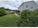 A backyard featuring a walkway with a shrub, lawn, and privacy fence, with a patio at 2511 Dalmahoy Ln, Fuquay Varina, NC 27526