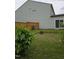 A backyard featuring a wood privacy fence and an open green lawn area at 2511 Dalmahoy Ln, Fuquay Varina, NC 27526