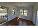 Bright living room with two large windows overlooking the backyard at 2511 Dalmahoy Ln, Fuquay Varina, NC 27526
