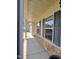 Covered porch with stone accents, offering a glimpse of the home's exterior at 2511 Dalmahoy Ln, Fuquay Varina, NC 27526