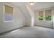 Upstairs bedroom with carpet, white walls, and natural light from multiple windows at 253 Tobacco Farm Way, Chapel Hill, NC 27516