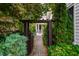 Charming walkway and lush landscaping leading to the front door and porch at 253 Tobacco Farm Way, Chapel Hill, NC 27516