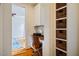 Convenient home office nook with built-in storage and desk; hardwood flooring at 253 Tobacco Farm Way, Chapel Hill, NC 27516