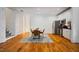 Open floor plan with modern kitchen and dining space bathed in natural light at 253 Tobacco Farm Way, Chapel Hill, NC 27516