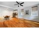 Open living area with hardwood floors flowing into a modern kitchen and dining space at 253 Tobacco Farm Way, Chapel Hill, NC 27516