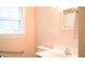 Bathroom with standard sink, mirror and toilet at 2626 Crestline Ave, Raleigh, NC 27603