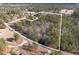 An aerial view outlines nearly 15 acres of wooded property with road frontage at 2630 Ponderosa Rd, Cameron, NC 28326