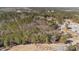 Picturesque aerial view of the property highlighting the serene wooded acreage at 2630 Ponderosa Rd, Cameron, NC 28326