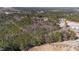 Expansive aerial view of wooded acreage providing privacy and a peaceful natural setting at 2630 Ponderosa Rd, Cameron, NC 28326